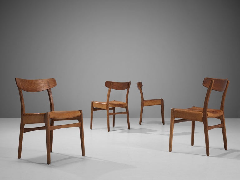 Hans J. Wegner for Carl Hansen Set of Four Chairs in Cognac Leather and Oak