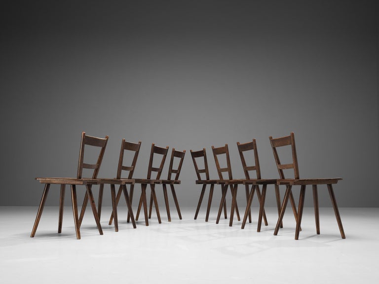 Set of Eight French Pastoral Dining Chairs in Stained Wood