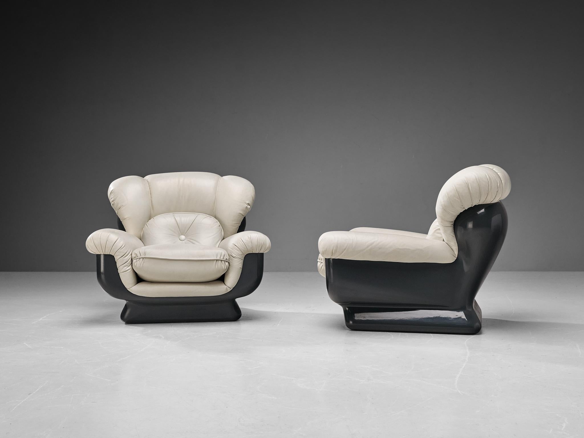 Italian Bulky Pair of Lounge Chairs in Fiberglass and Leatherette