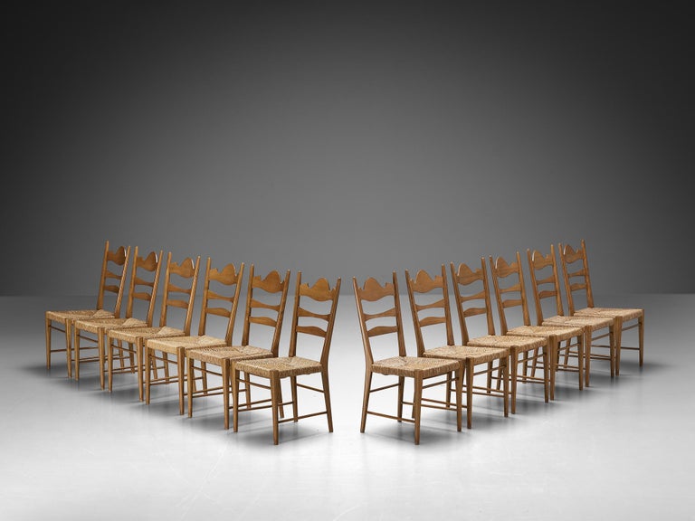 Set of Twelve Italian Dining Chairs with Carved Backs and Straw Seats