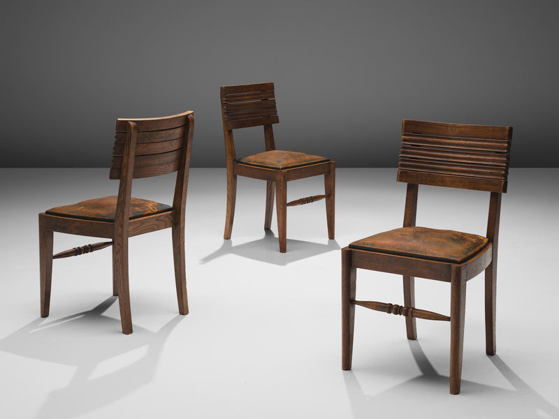 Gaston Poisson Set of Six Dining Chairs in Oak and Leather
